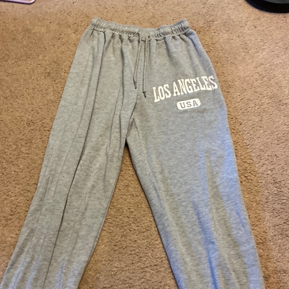 Lightly worn grey sweats